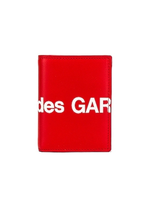 COMME des GARCONS Huge Logo Wallet in Red - Red. Size all.