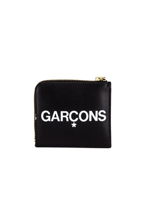 COMME des GARCONS Huge Logo Wallet in Black - Black. Size all.