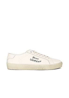 Saint Laurent Embroidered Sneakers in Panna - Ivory. Size 35 (also in 35.5, 36, 36.5, 37, 37.5, 38, 39, 39.5, 40, 40.5, 41, 42).