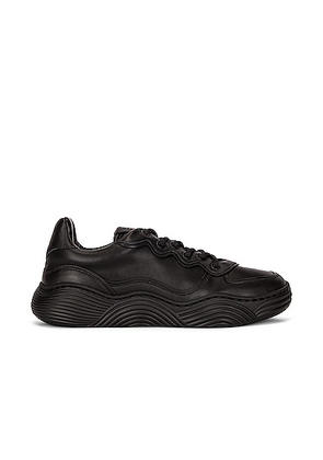 ALAÏA Veau Wave Sneakers in Noir - Black. Size 36 (also in 37, 38, 39).
