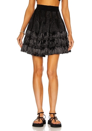 ALAÏA Courte Raphia Franges Skirt in Noir - Black. Size 40 (also in ).