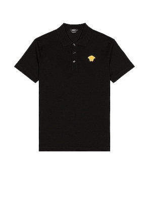 VERSACE Polo in Black - Black. Size L (also in M, S, XL, XS).