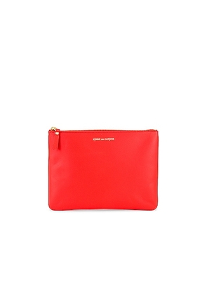 COMME des GARCONS Classic Leather Pouch in Orange - Orange. Size all.
