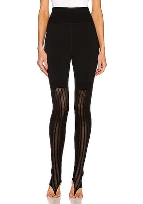 ALAÏA Lace Legging in Noir - Black. Size S (also in ).