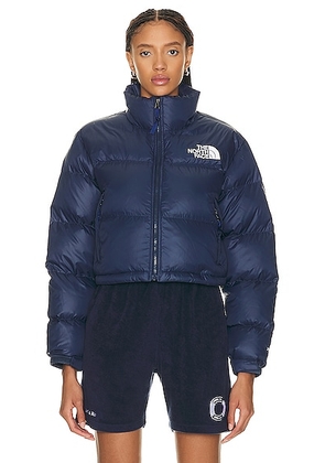 The North Face Nuptse Short Jacket in Summit Navy - Navy. Size L (also in M, S, XL, XS).