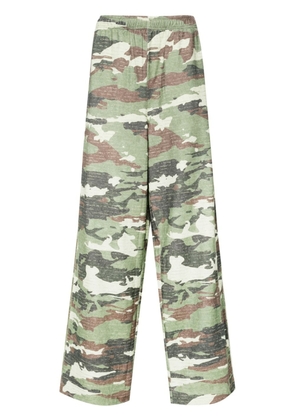 Acne Studios camouflage logo-embellished trousers - Green