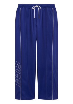 Gucci embossed-logo track pants - Blue