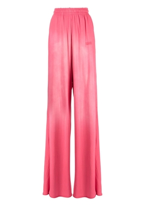 VETEMENTS washed wide-leg track pants - Pink