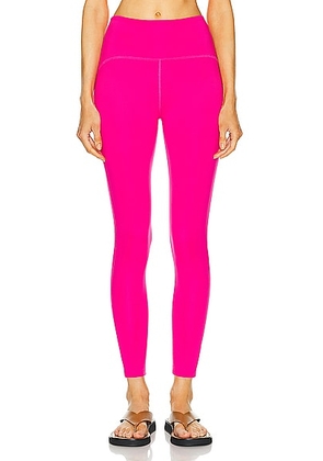 Beyond Yoga Power Beyond Strive High Waisted Midi Legging in Pink Energy - Fuchsia. Size L (also in M, S, XS).