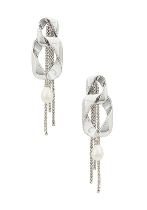 Amber Sceats Layered Earrings in Metallic Silver.
