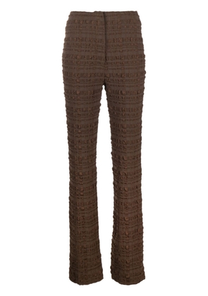 Nanushka Juna seersucker-texture slim-fit trousers - Brown