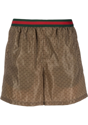 Gucci GG Supreme-print swim shorts - Brown