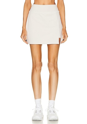 Beyond Yoga Heather Rib Hold Court Skirt in Cream Heather - Cream. Size L (also in M, S, XS).