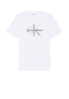 Calvin Klein Mono Logo Tee in White. Size M, S, XS.