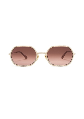 Chloe Scalloped Oval Sunglasses in Metallic Gold.