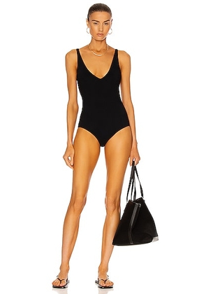 Toteme Deep Neck One Piece Swimsuit in Black - Black. Size XS (also in ).