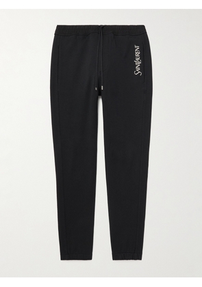 SAINT LAURENT - Tapered Logo-Embroidered Cotton-Jersey Sweatpants - Men - Black - XS