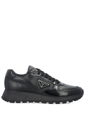 Prada triangle-logo leather sneakers - Black