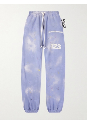 RRR123 - Gym Bag Logo-Print Paint-Splattered Cotton-Jersey Sweatpants - Men - Purple - 1