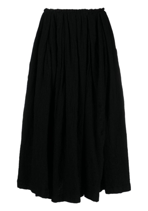 Black Comme Des Garçons pleated wool skirt