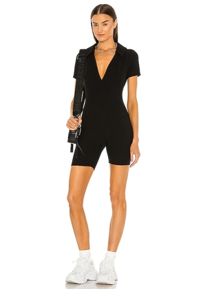 YEAR OF OURS Polo Romper in Black. Size M, XL.