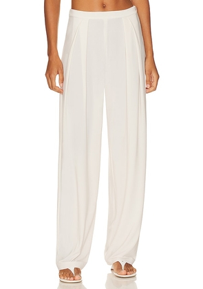Norma Kamali Tapered Pleated Trouser in Cream. Size L, M, XL, XS, XXS.