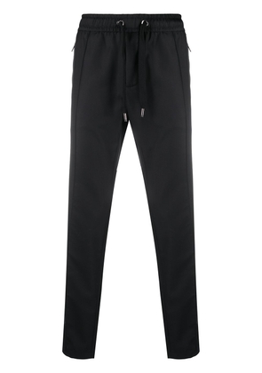 Dolce & Gabbana logo-tag wool track pants - Black
