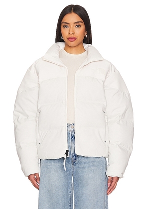 The North Face Steep Tech Nuptse Down Jacket in White. Size M, S, XL/1X.