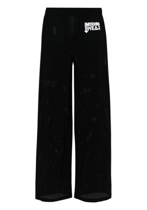 Moschino logo-print wide-leg trousers - Black