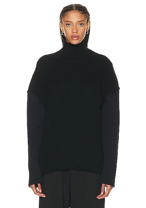The Row Dua Sweater in Black & Navy - Black. Size L (also in M, XS).