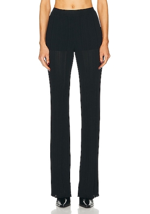 Stella McCartney Lightweight Plisse Knit Trousers in Black - Black. Size L (also in M, S).