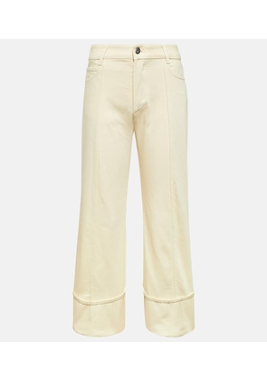 Bottega Veneta Asymmetric mid-rise cropped jeans