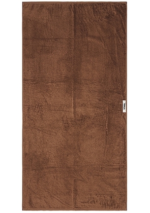 Tekla Solid Bath Towel in Kodiak Brown - Brown. Size all.