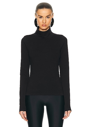 Balenciaga Turtleneck Seamless Sweater in Black - Black. Size M (also in L, S, XS).