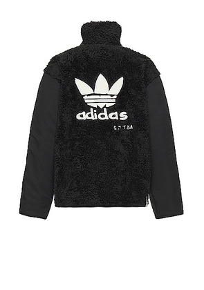 adidas by Song for the Mute Fleece Blk in Black - Black. Size L (also in M, S, XL/1X).