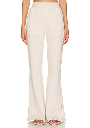 NSF Rusty Side Slit Flair Pant in Beige. Size L, S, XL, XS.