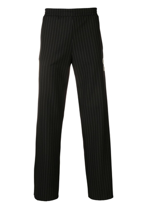 Off-White pinstriped eagle stripe trousers - Black