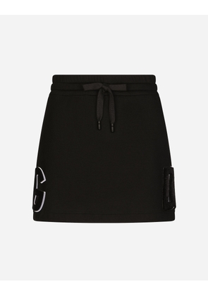 Dolce & Gabbana Jersey Miniskirt With Logo Patch - Woman Skirts Black Cotton 44