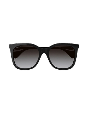 Gucci Mini Running Cat Eye Sunglasses in Black.