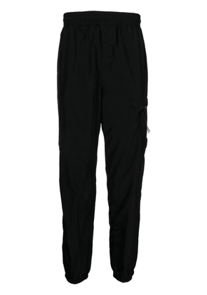 C.P. Company elasticated tapered-leg trousers - Black