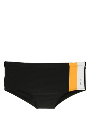Osklen logo-print stripe-detail swimming trunks - Black