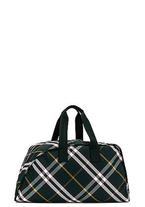 Burberry Duffle Bag in Ivy - Dark Green. Size all.