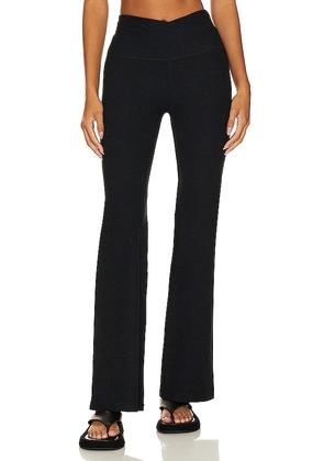 Beyond Yoga At Your Leisure Bootcut Pant in Black. Size M, S, XL, XS.