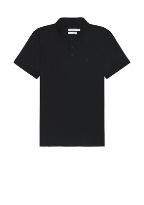 Calvin Klein Smooth Classic Solid Polo in Black. Size M, S.