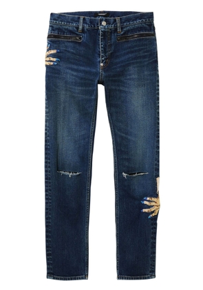 Undercover motif-embroidered straight-leg jeans - Blue