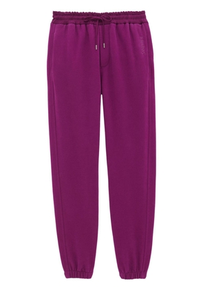 Saint Laurent embroidered-logo cotton track pants - Purple