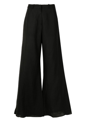 Adriana Degreas flared linen-blend trousers - Black