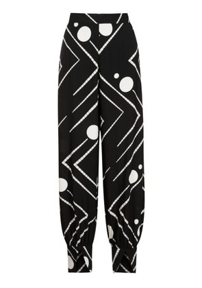 Adriana Degreas Carrot Deco geometric-print trousers - Black