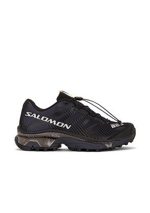Salomon XT-4 OG Sneaker in Black. Size 11.5, 12, 12.5, 13, 7.5, 8, 8.5, 9, 9.5.