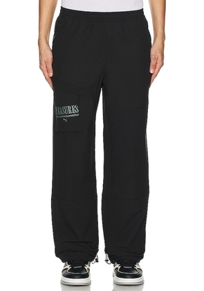 Puma Select X Pleasures Cargo Pants in Black. Size L, S, XL/1X.